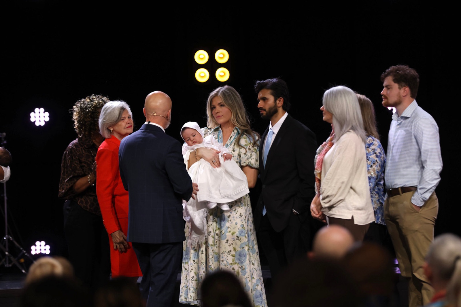 Praying over a family at Life of Faith Church
